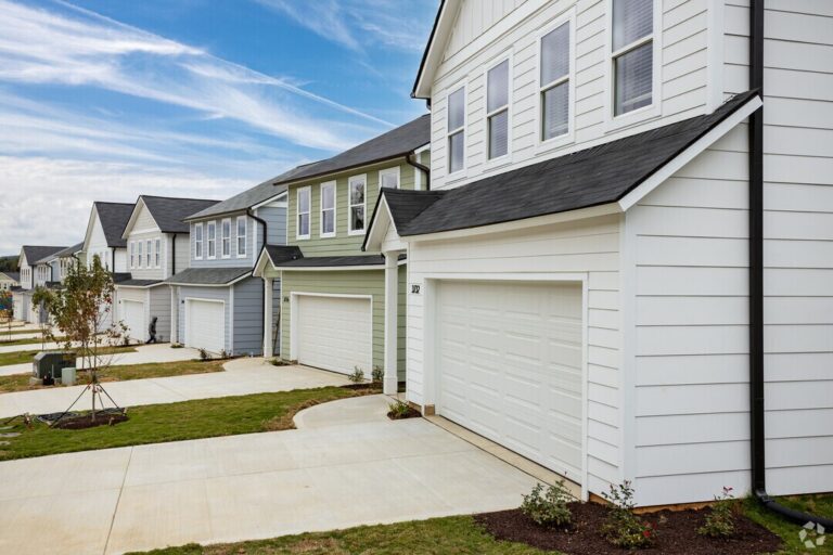 A row of single-family homes along a street at Highline at Knoxville