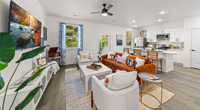 Open-plan living area connecting through to the kitchen